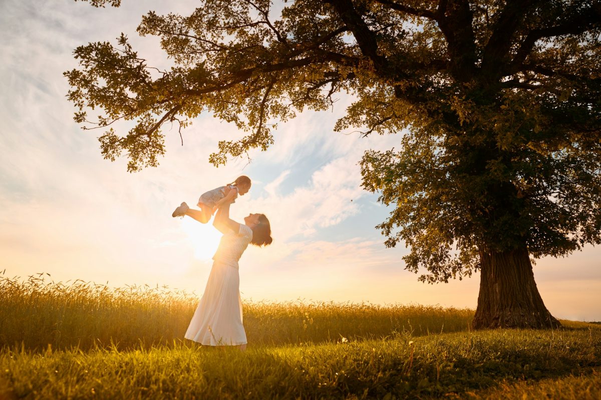 Happy family on summer walk